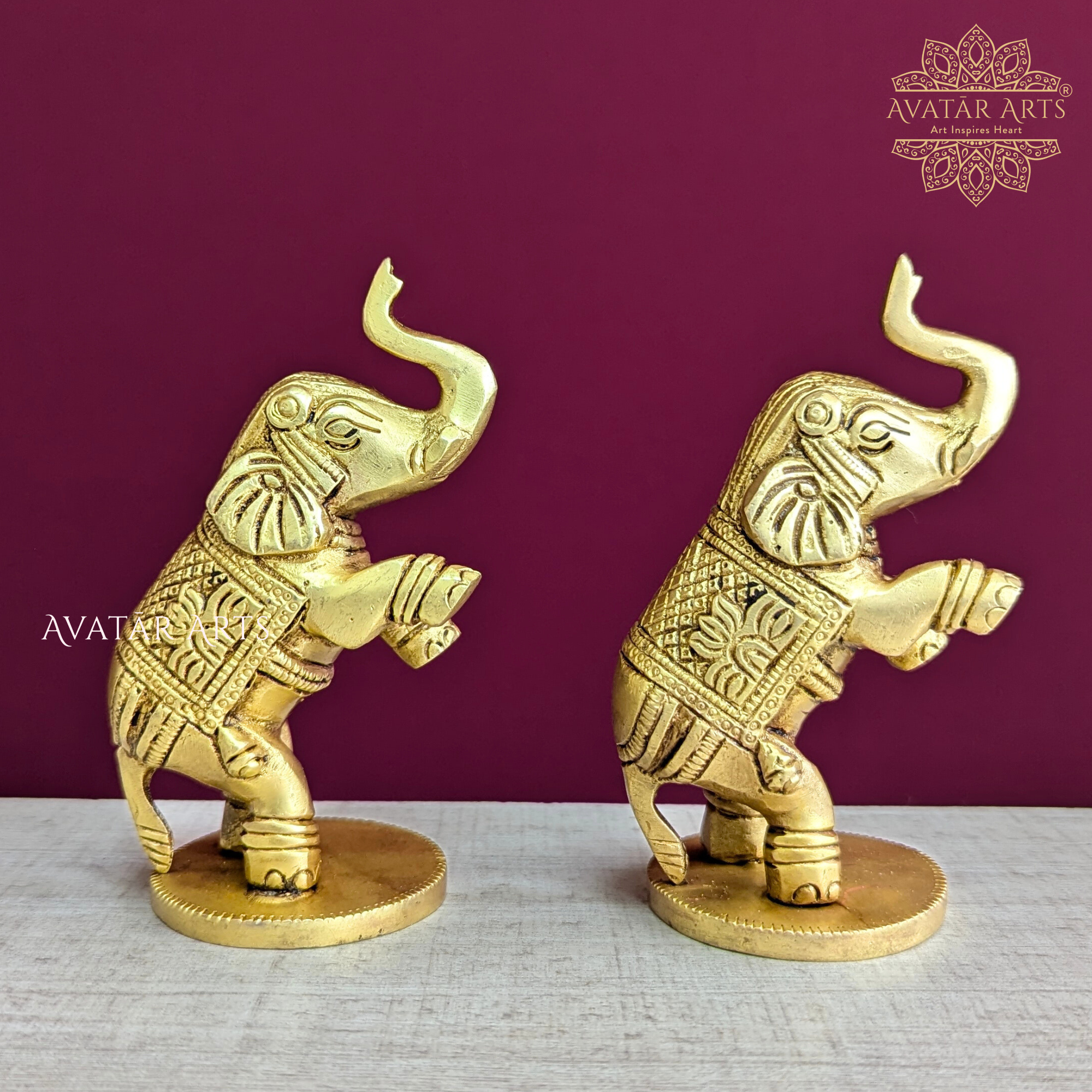 Brass Elephants Jumping
