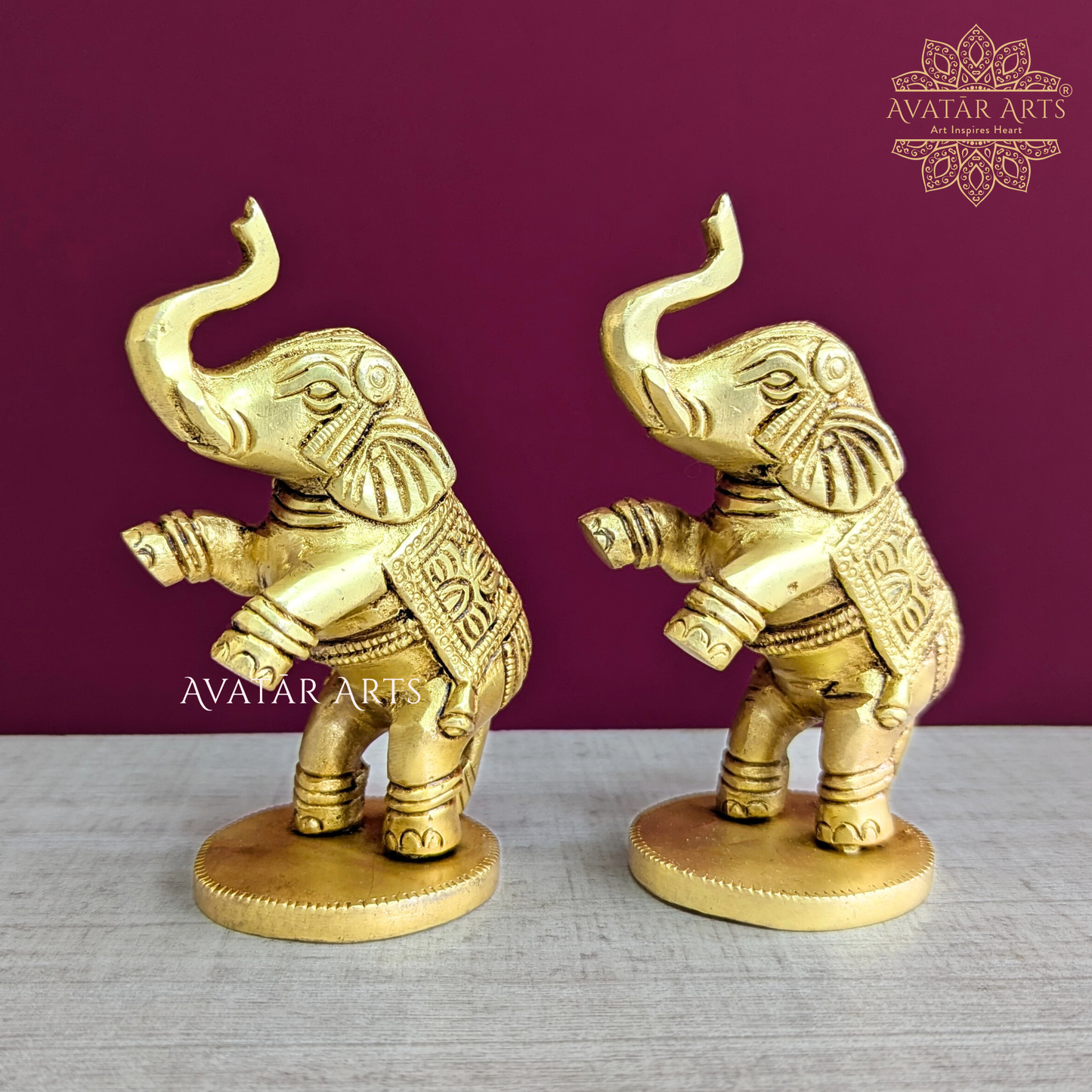 Brass Elephants Jumping