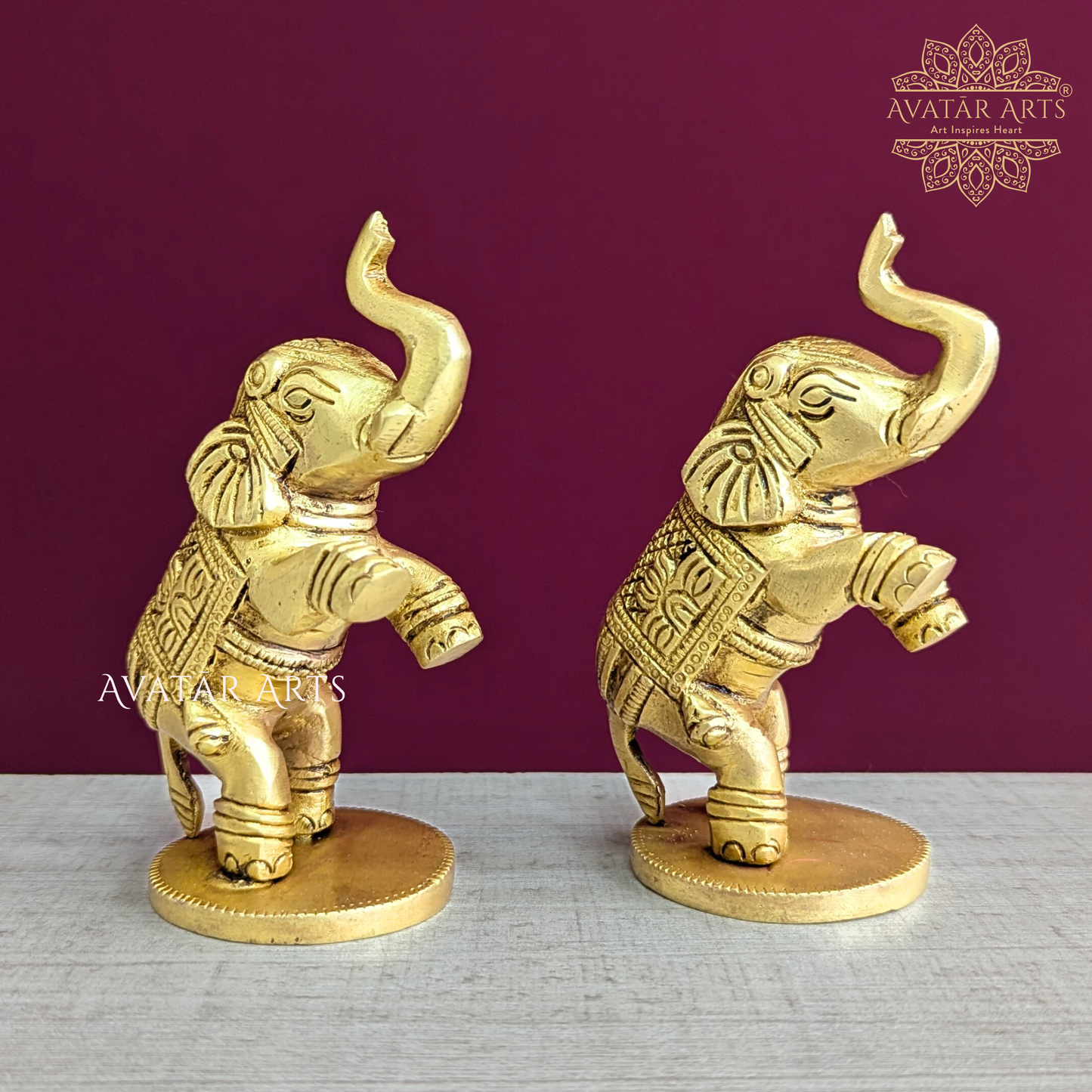 Brass Elephants Jumping