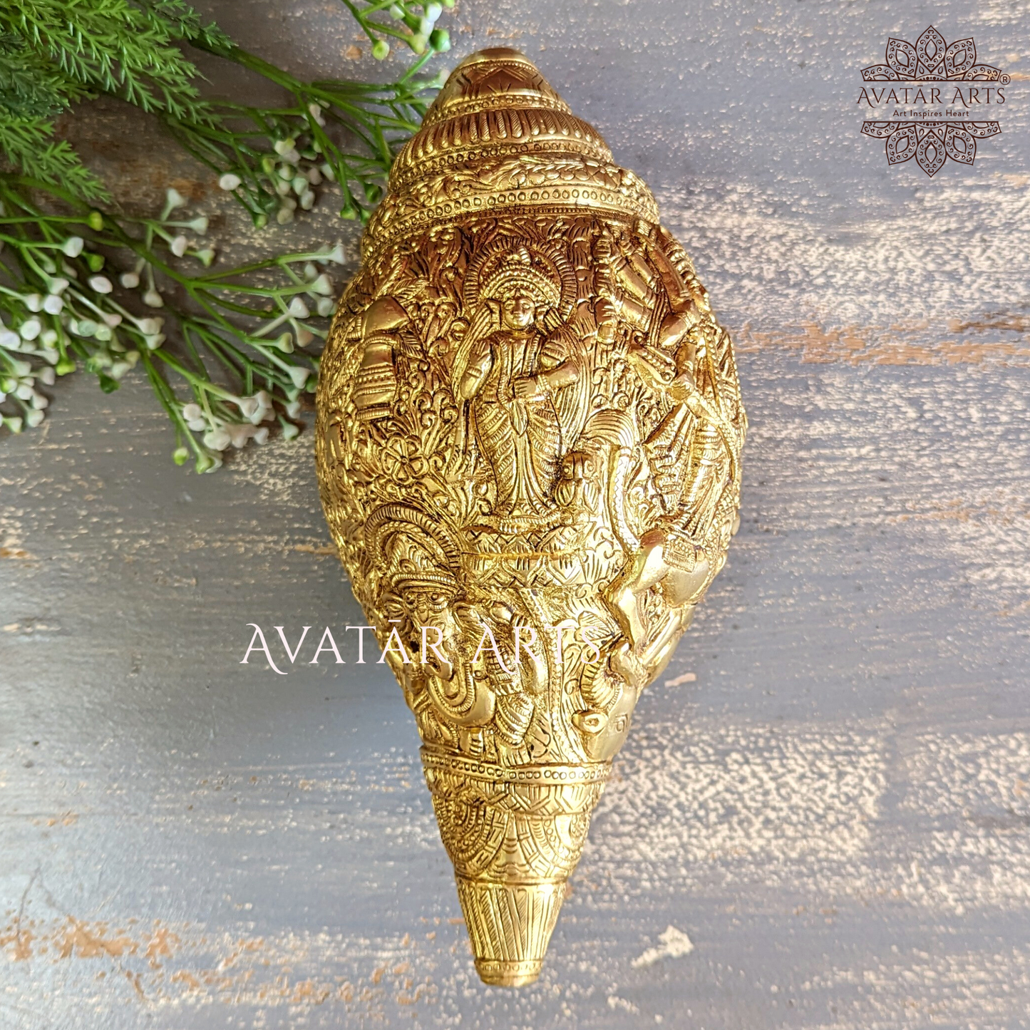 Brass conch with Goddess Durga carving